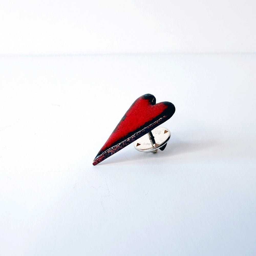 red-enamel-heart-brooch-pin-on-a-white-background
