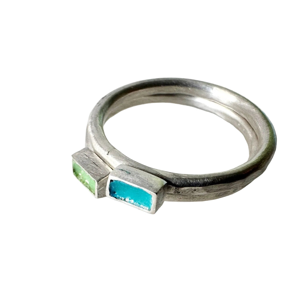 pair-of-silver-stacking-rings-with-green-enamel
