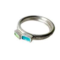 pair-of-silver-stacking-rings-with-green-enamel
