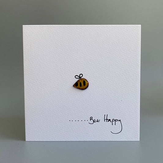 yellow copper enamel Bee greeting card with handwritten 'Bee Happy' text 