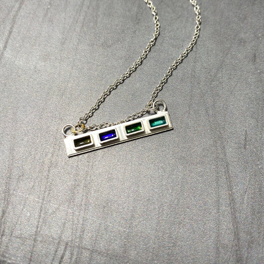 Sterling silver bar necklace with tiny rectangle cells filled with enamel in blue and green