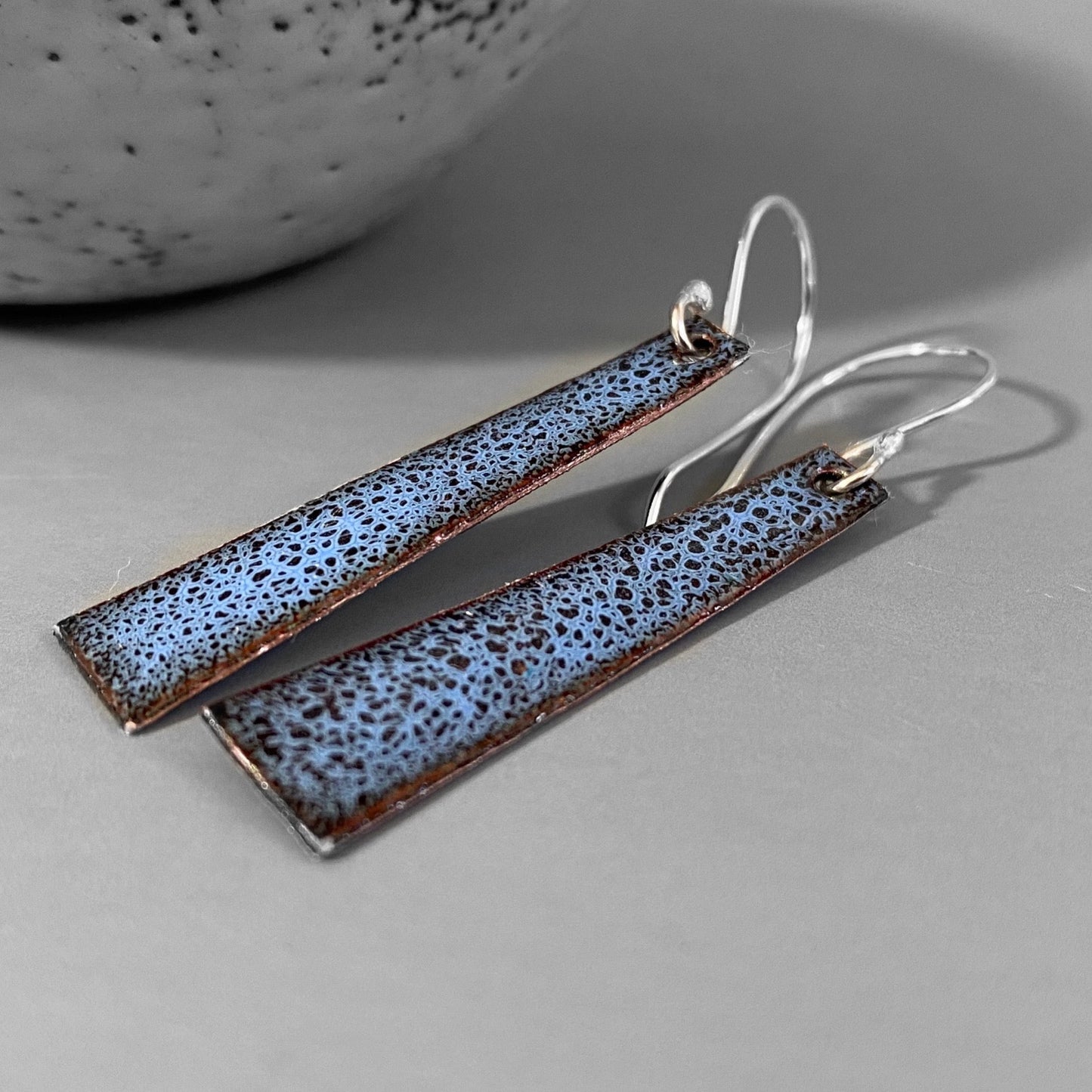 Trapezoid shaped copper earrings enamelled in blue on silver ear wires