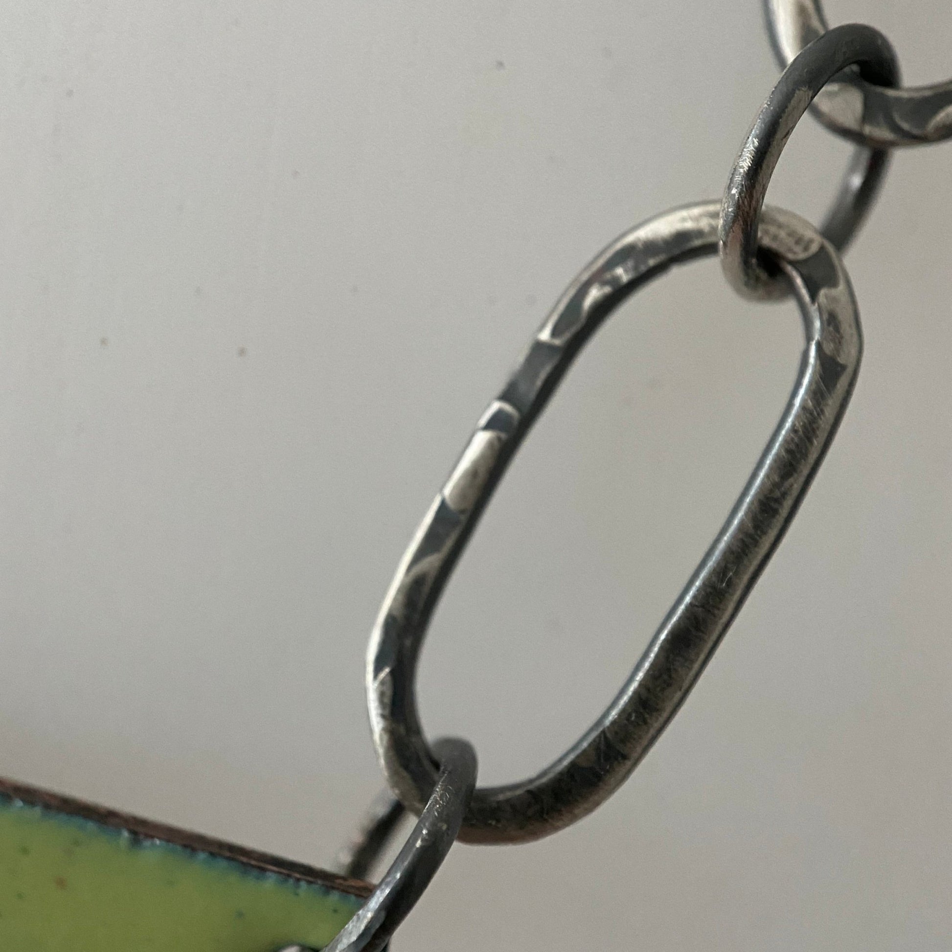 Close up of handmade paper clip link - MaisyPlum