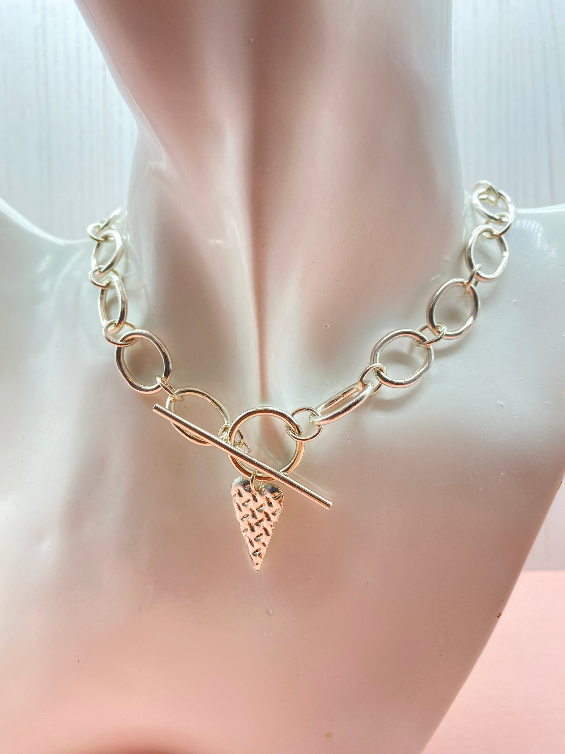Link necklacewith silver heart charm and toggle clasp on mannequin - MaisyPlum