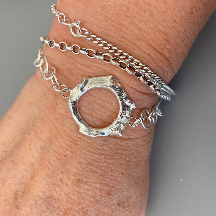 Freeform Silver Bracelet photographed from above in a ladies wrist - MaisyPlum